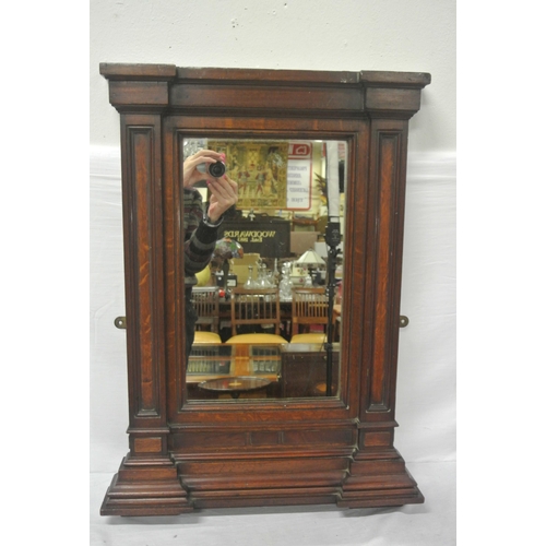 213 - Edwardian oak framed wall mirror with breakfront top