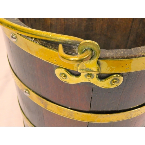 223 - Georgian style round peat bucket with brass banding & shaped brass handle