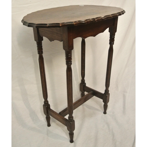 24 - Oval oak Victorian occasional table with wavy border, turned columns & legs