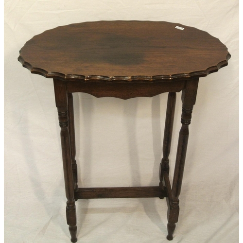 24 - Oval oak Victorian occasional table with wavy border, turned columns & legs