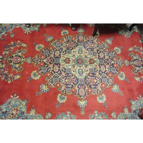 37 - Fine woven Persian Sarouk Viss carpet terracotta ground with hints of duck egg blue medallion design... 