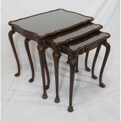 46 - Victorian nest of three mahogany glass topped tables with serpentine borders, on carved cabriole leg... 