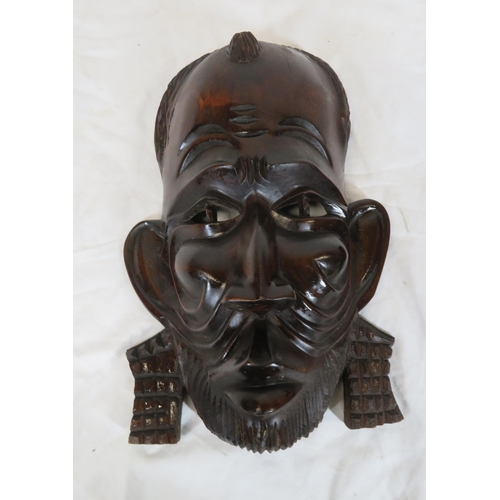 57 - Pair of African tribal art carved face masks