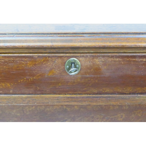 65 - Edwardian mahogany kneehole desk with seven drawers, shaped brass drop handles, on bracket feet