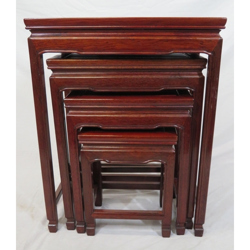 74 - Nest of four Oriental style tables with chamfered legs & stretchers