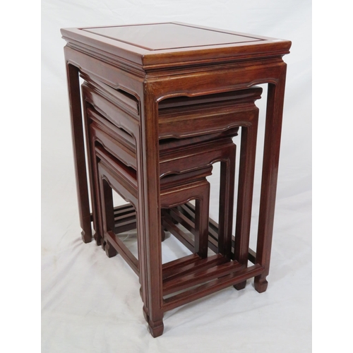 74 - Nest of four Oriental style tables with chamfered legs & stretchers