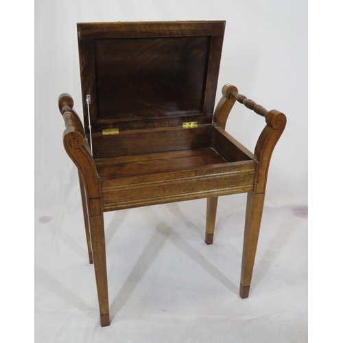 94 - Edwardian mahogany piano stool with upholstered lift-up lid, turned handles & tapering legs