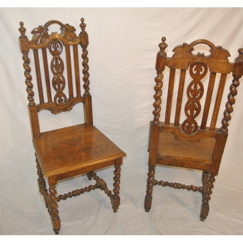 307 - Pair of Victorian carved oak high back hall chairs with foliate carved & twisted rails, on barleytwi... 