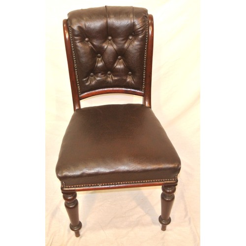 309 - Victorian mahogany occasional chair with buttoned leather upholstery, on turned tapering legs