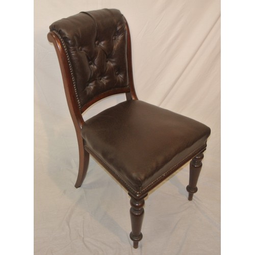 309 - Victorian mahogany occasional chair with buttoned leather upholstery, on turned tapering legs