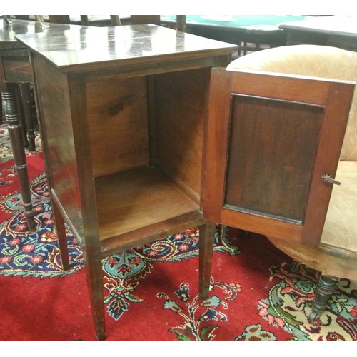 66 - Edwardian mahogany press with panelled door, drop handle, on square tapering legs