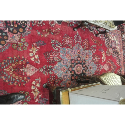 212 - Rich red ground Persian Afshar carpet with central floral medallion and deep ground border 330 x 230