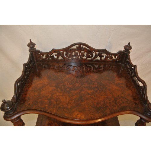 61 - Victorian walnut three tier serpentine fronted whatnot with pierced gallery, turned finials & column... 