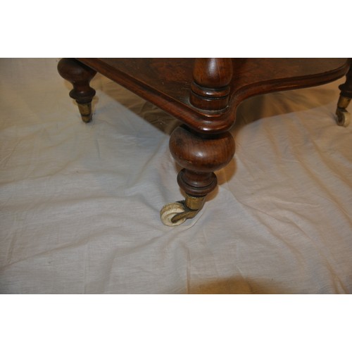 61 - Victorian walnut three tier serpentine fronted whatnot with pierced gallery, turned finials & column... 