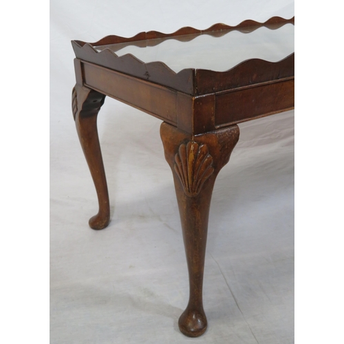 16 - Edwardian mahogany oblong coffee or occasional table with wavy border, glass inset, on cabriole legs... 