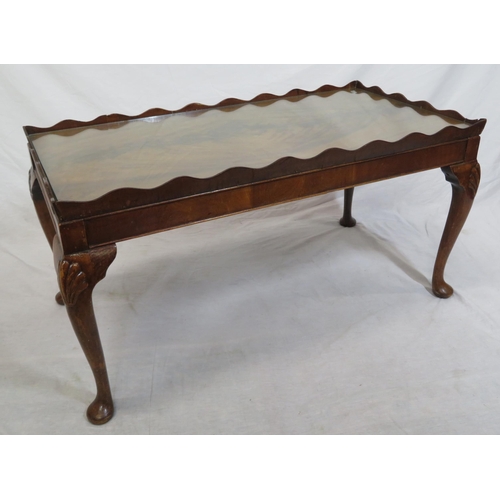 16 - Edwardian mahogany oblong coffee or occasional table with wavy border, glass inset, on cabriole legs... 