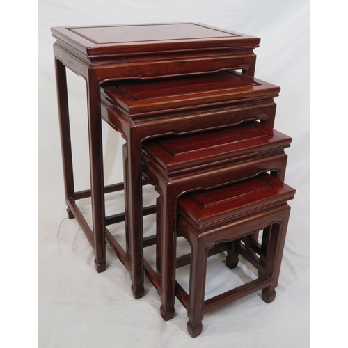 26 - Nest of four Oriental style tables with chamfered legs & stretchers