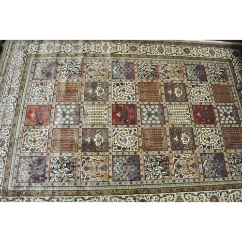 28 - Cream ground multi-coloured field Kashmir rug of Persian panel design 240 x 160