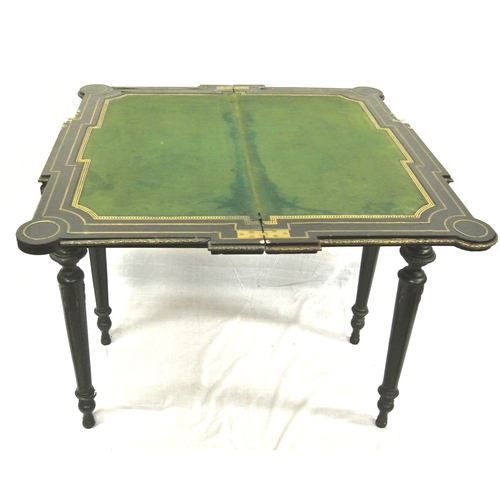 125 - French Empire style ebonised card table with fold-over top, brass inlay, 'dog-ear' candle corners, r... 