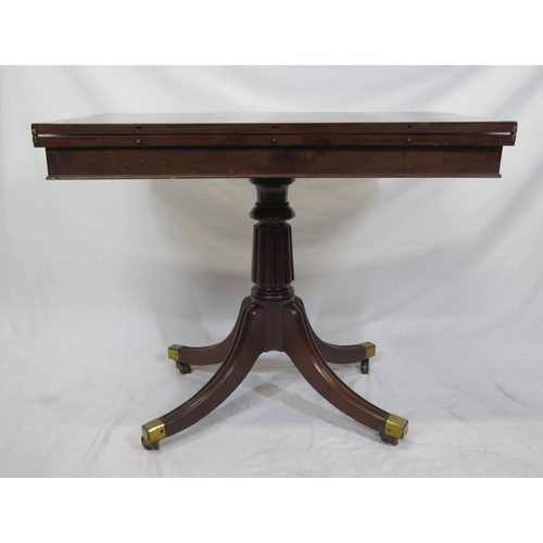 100 - Victorian mahogany tea table with swivel fold-over top, raised on reeded turned column, on splayed t... 