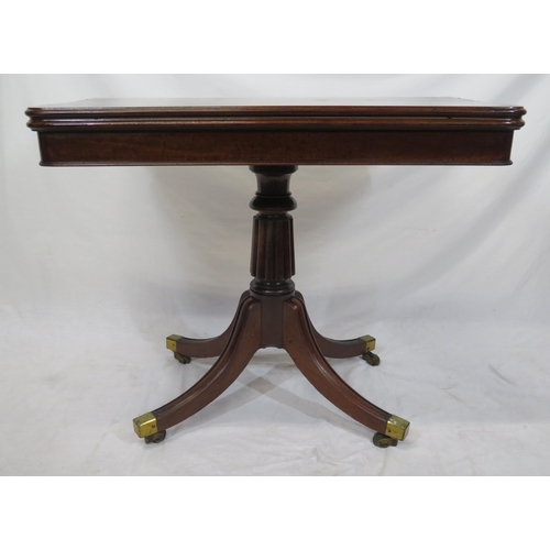 100 - Victorian mahogany tea table with swivel fold-over top, raised on reeded turned column, on splayed t... 