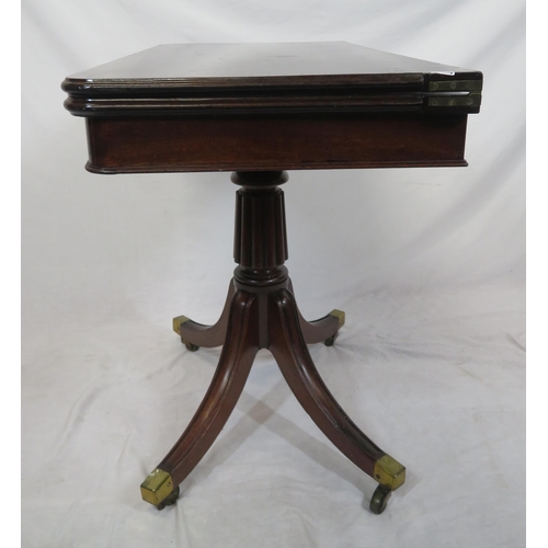 100 - Victorian mahogany tea table with swivel fold-over top, raised on reeded turned column, on splayed t... 