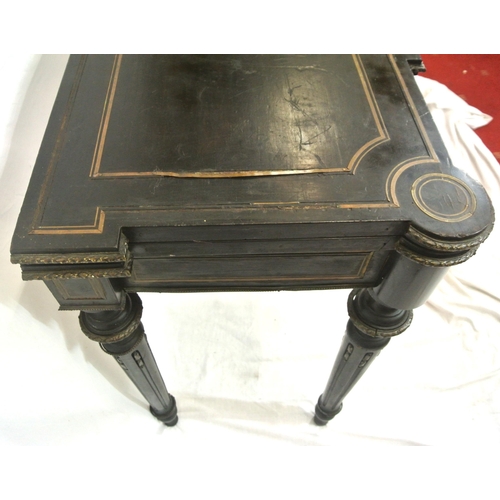 125 - French Empire style ebonised card table with fold-over top, brass inlay, 'dog-ear' candle corners, r... 