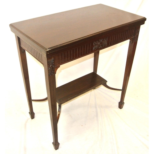 126 - Edwardian mahogany card table with fold-over swivel top, reeded & foliate decorated frieze, on reede... 