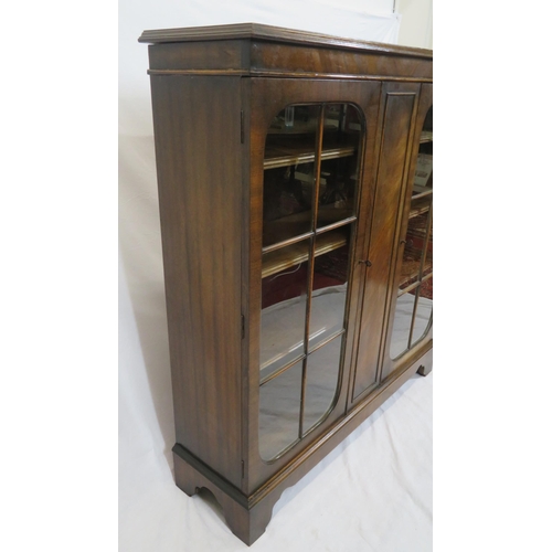 15 - Edwardian style mahogany bookcase with glazed doors, adjustable shelving, on bracket feet