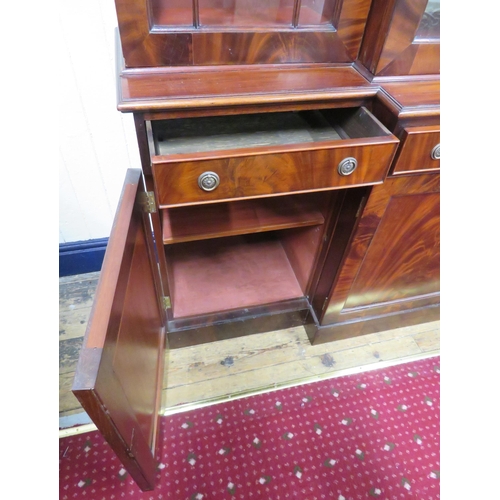 180 - Edwardian mahogany breakfront bookcase with dentil frieze, astragal glazed doors with shelved interi... 