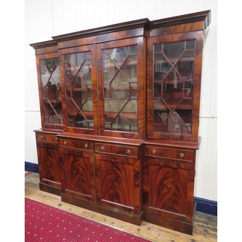 180 - Edwardian mahogany breakfront bookcase with dentil frieze, astragal glazed doors with shelved interi... 