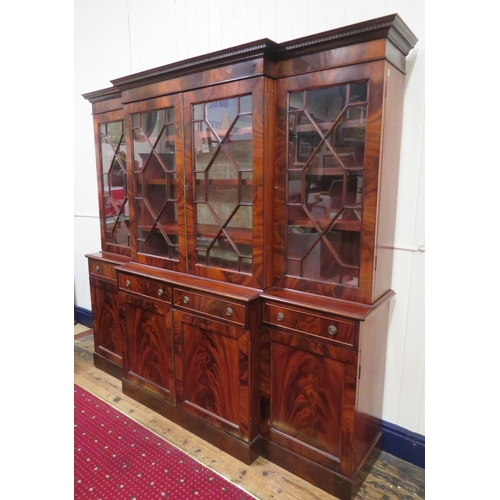 180 - Edwardian mahogany breakfront bookcase with dentil frieze, astragal glazed doors with shelved interi... 