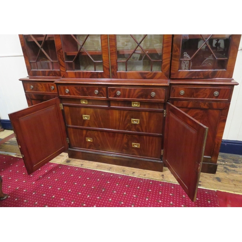 180 - Edwardian mahogany breakfront bookcase with dentil frieze, astragal glazed doors with shelved interi... 