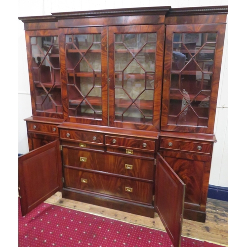 180 - Edwardian mahogany breakfront bookcase with dentil frieze, astragal glazed doors with shelved interi... 