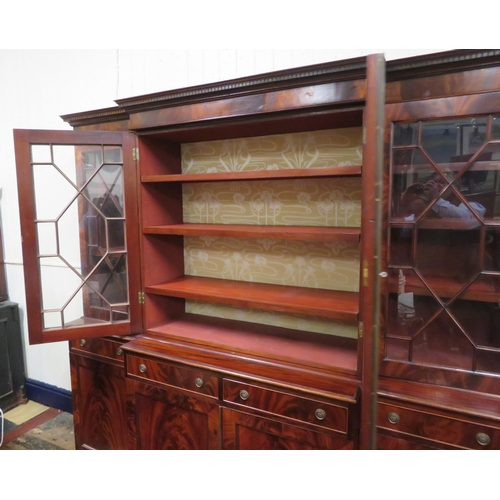 180 - Edwardian mahogany breakfront bookcase with dentil frieze, astragal glazed doors with shelved interi... 