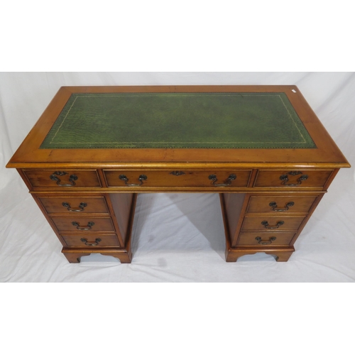 35 - Edwardian yew pedestal desk with leatherette top & six side drawers with drop handles, on bracket fe... 