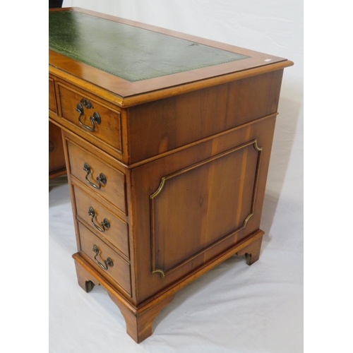 35 - Edwardian yew pedestal desk with leatherette top & six side drawers with drop handles, on bracket fe... 