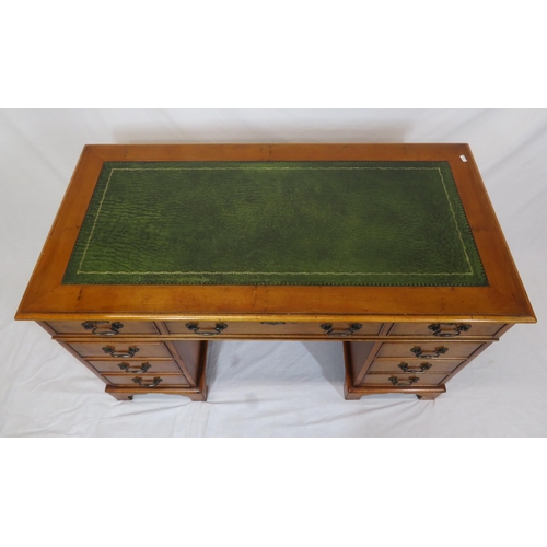 35 - Edwardian yew pedestal desk with leatherette top & six side drawers with drop handles, on bracket fe... 