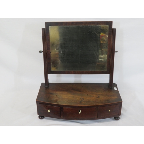 38 - Edwardian mahogany swivel mirror with reeded columns, bow fronted base with three drawers