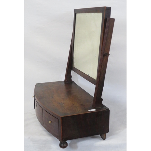 38 - Edwardian mahogany swivel mirror with reeded columns, bow fronted base with three drawers