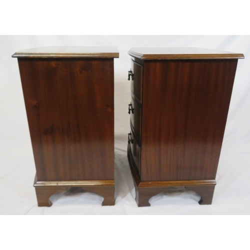 41 - Pair of Edwardian style bow fronted chests of three drawers with drop handles, on bracket feet