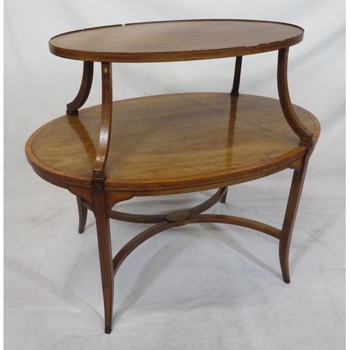 46 - Edwardian oval inlaid & crossbanded two tier serving or occasional table, with shaped columns, on sq... 