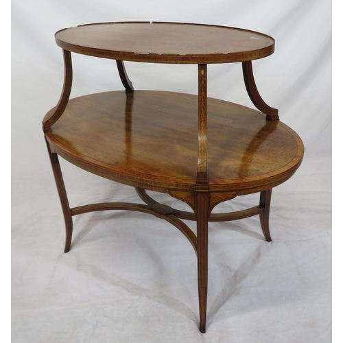 46 - Edwardian oval inlaid & crossbanded two tier serving or occasional table, with shaped columns, on sq... 