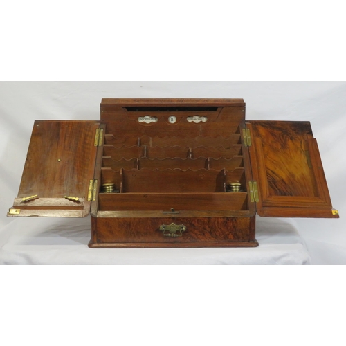 47 - Edwardian walnut stationery box with fold-out front & lid, lined interior, inkwells, drawer under wi... 