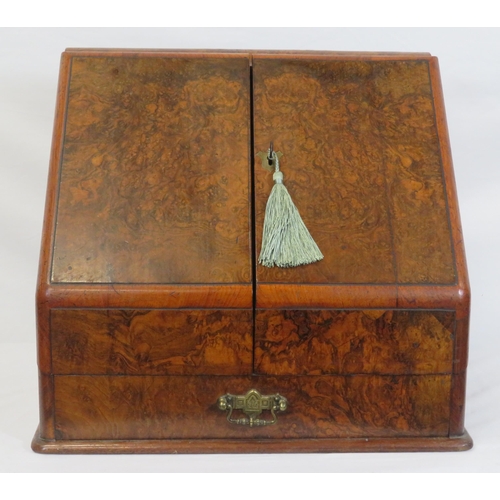 47 - Edwardian walnut stationery box with fold-out front & lid, lined interior, inkwells, drawer under wi... 