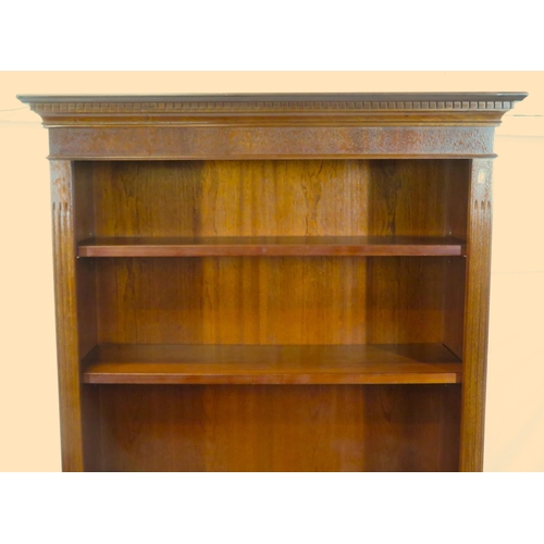 5 - Edwardian style mahogany bookcase with dentil frieze, adjustable shelving, on bracket feet