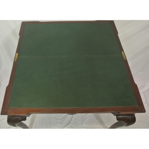 66 - Edwardian style mahogany card table with leatherette inset, fold-over top, gateleg support, on scrol... 