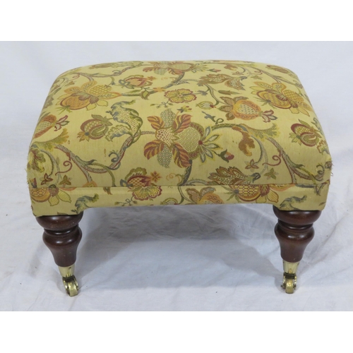 73 - Victorian design stool with foliate upholstery, turned tapering legs with castors