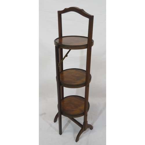 9 - Three tier mahogany adjustable plate stand with shaped handle