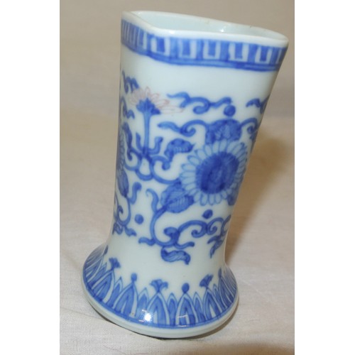 113 - Oriental small vase with blue and white foliate decoration